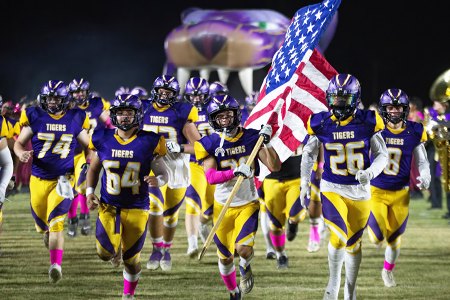 The Tigers pregame charge onto the field in Tiger Stadium.